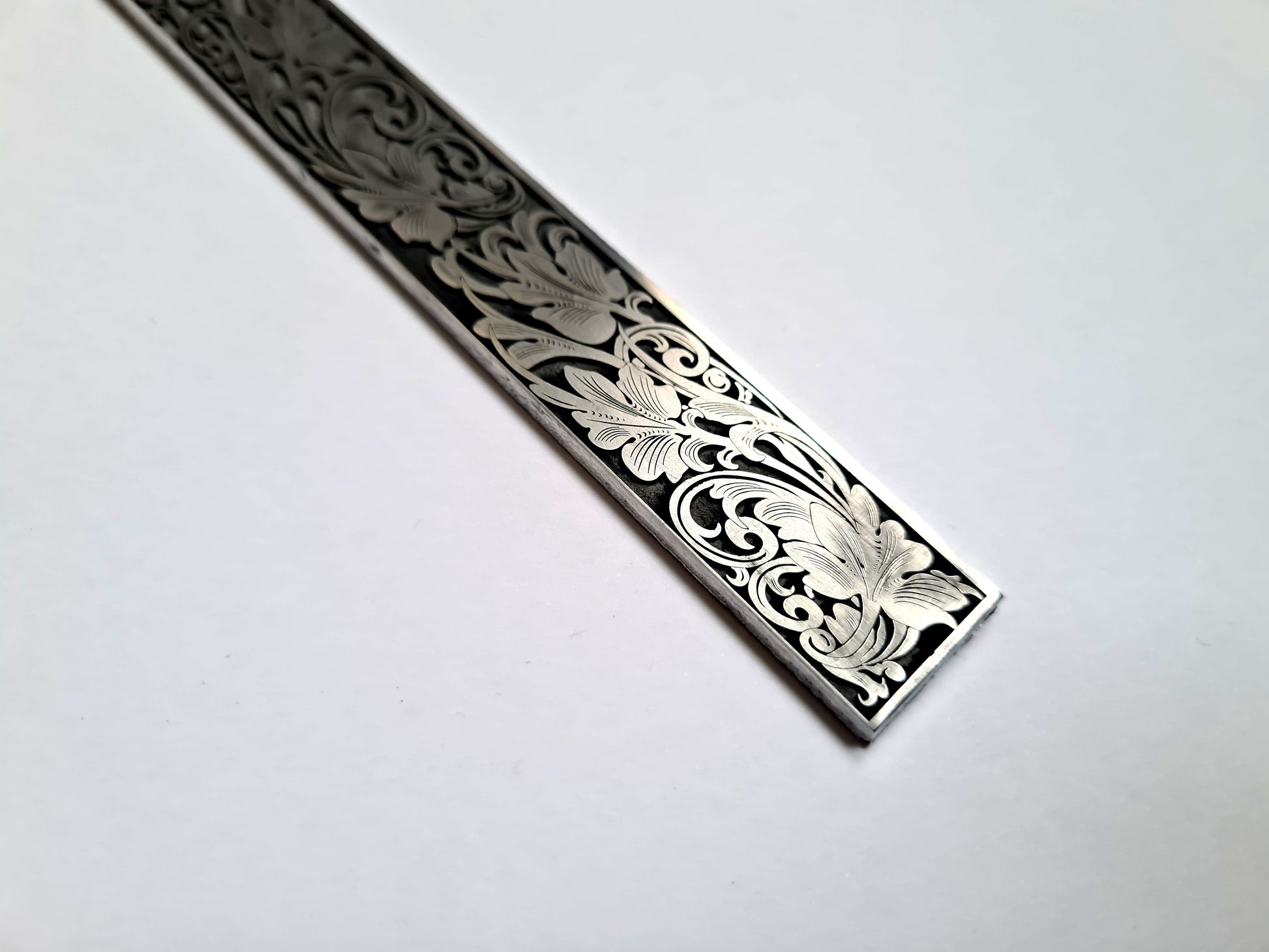 scroll engraved